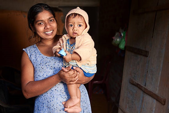 Mother holding her baby. Sri Lanka