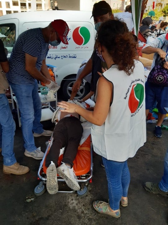 Karl Freiha, a health worker, was shot with multiple metal pellets while tending to an injured protester, despite wearing a recognizable uniform. 