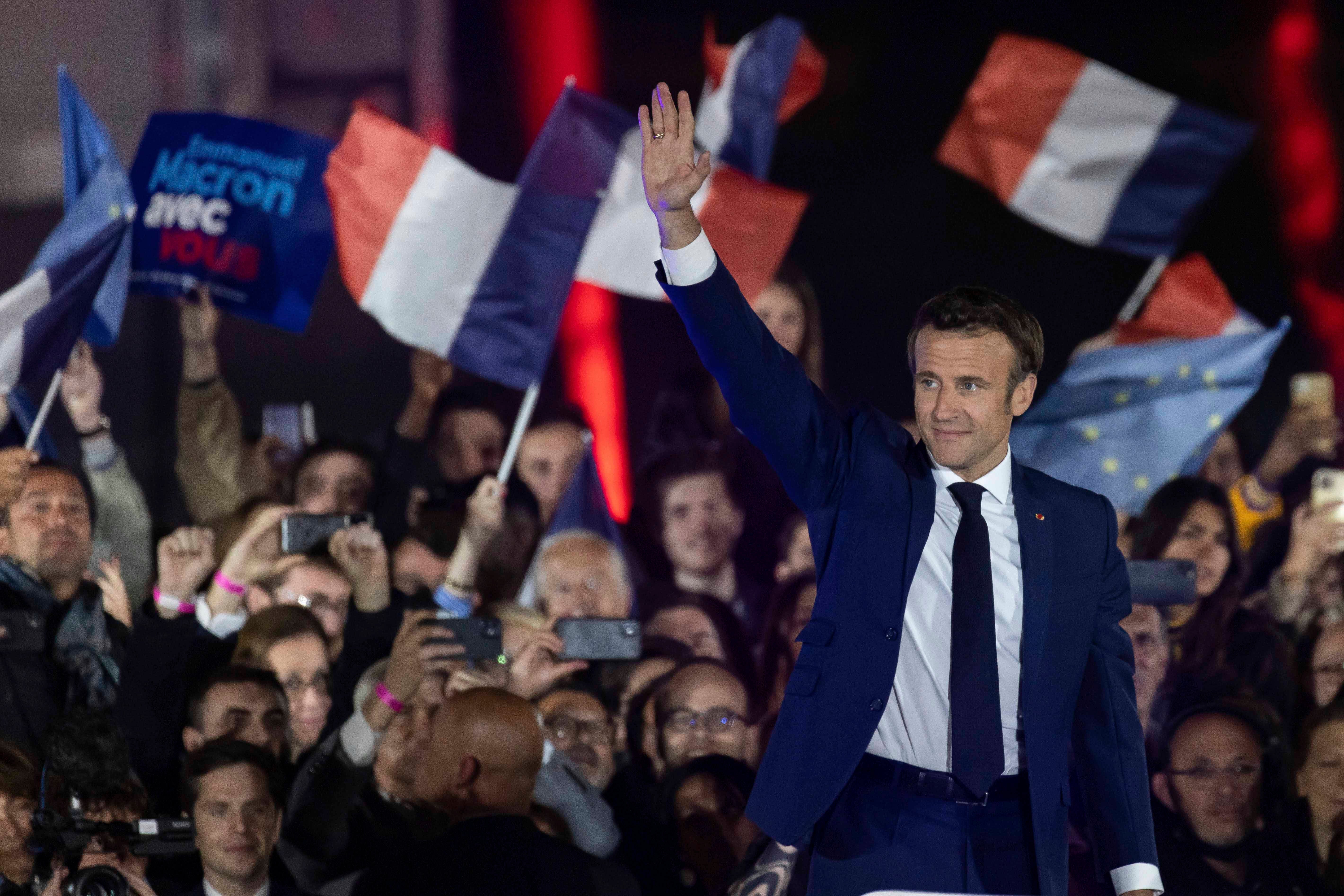 French President Emmanuel Macron delivers a speech after his election victory in Paris, April 24, 2022.