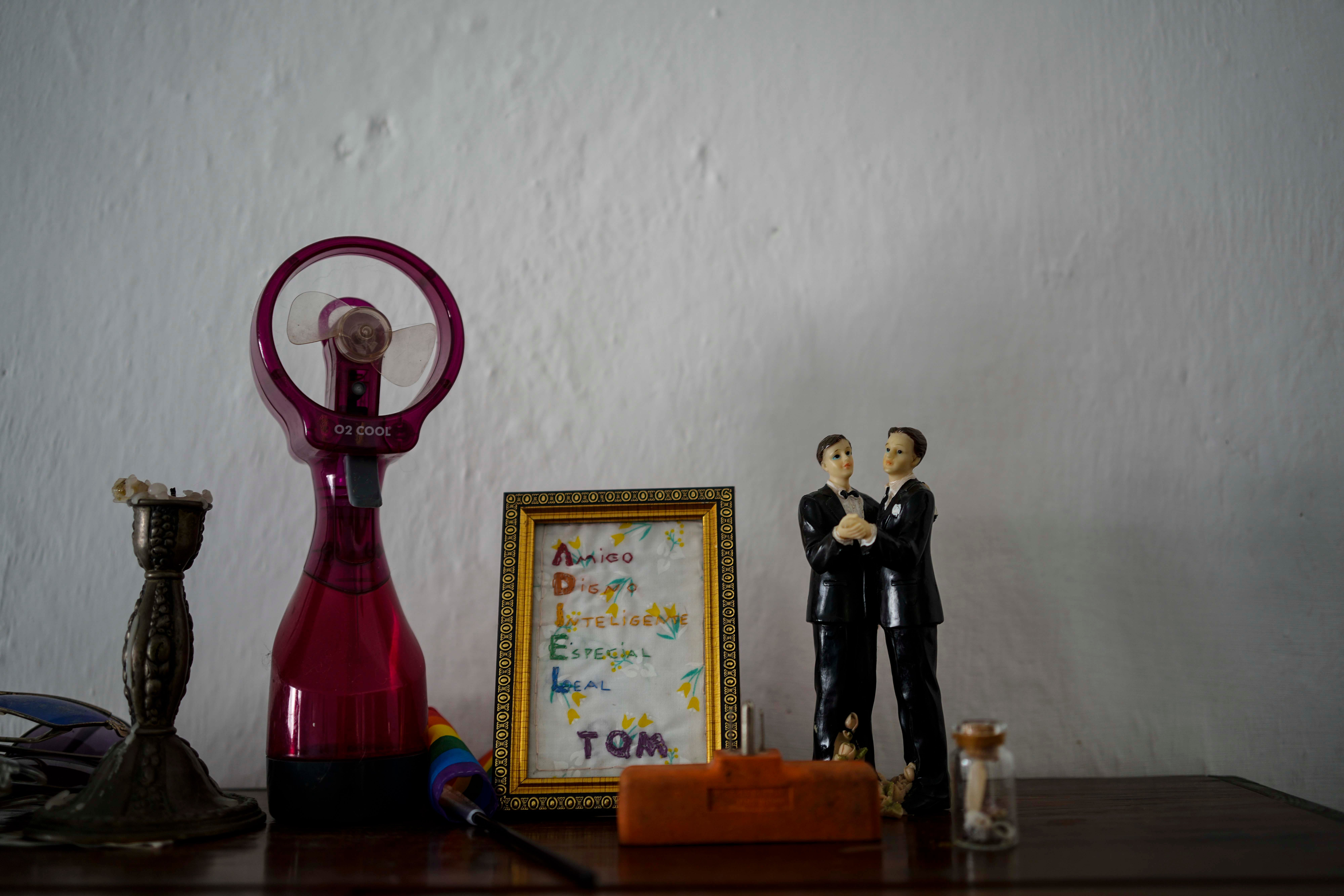 Figurine representing grooms displayed in the home of a same-sex couple in Matanzas, Cuba, in 2021. RAMON ESPINOSA AP