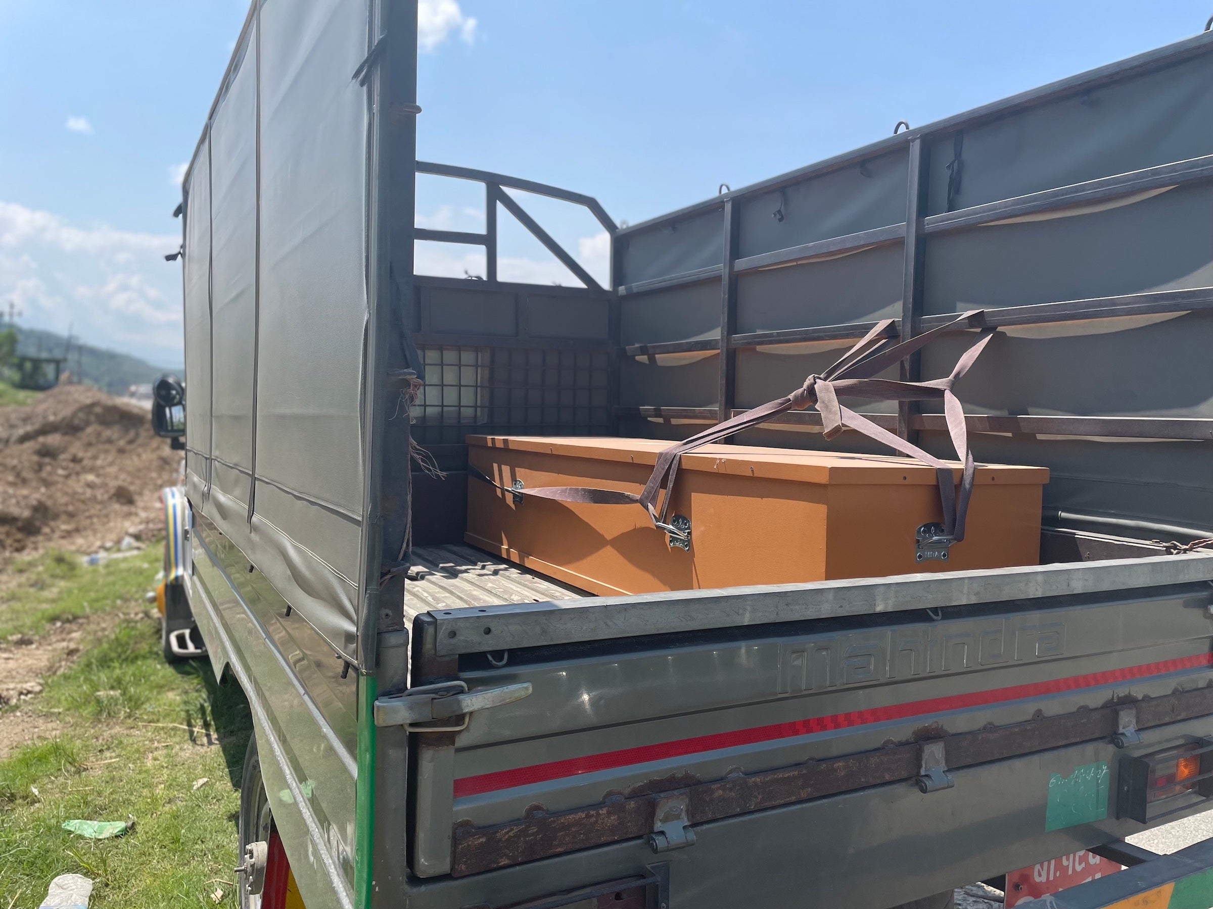 A casket of a deceased Nepali migrant worker being brought to their family.