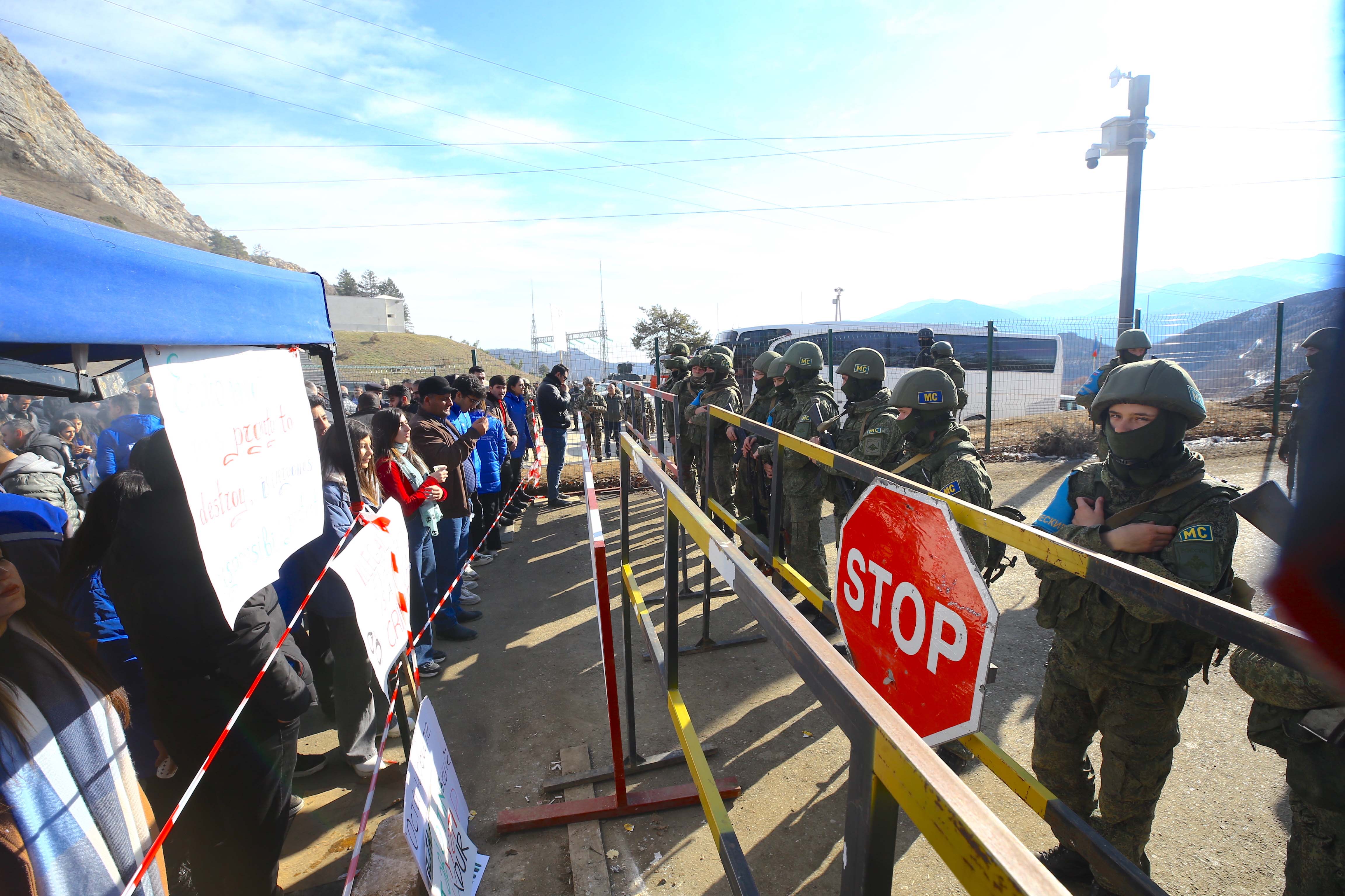 Azerbaijanis protesting on the Lachin road, opposite Russian peacekeeping forces, in Nagorno Karabakh, leading to the closure of the road since December 12, 2022. 