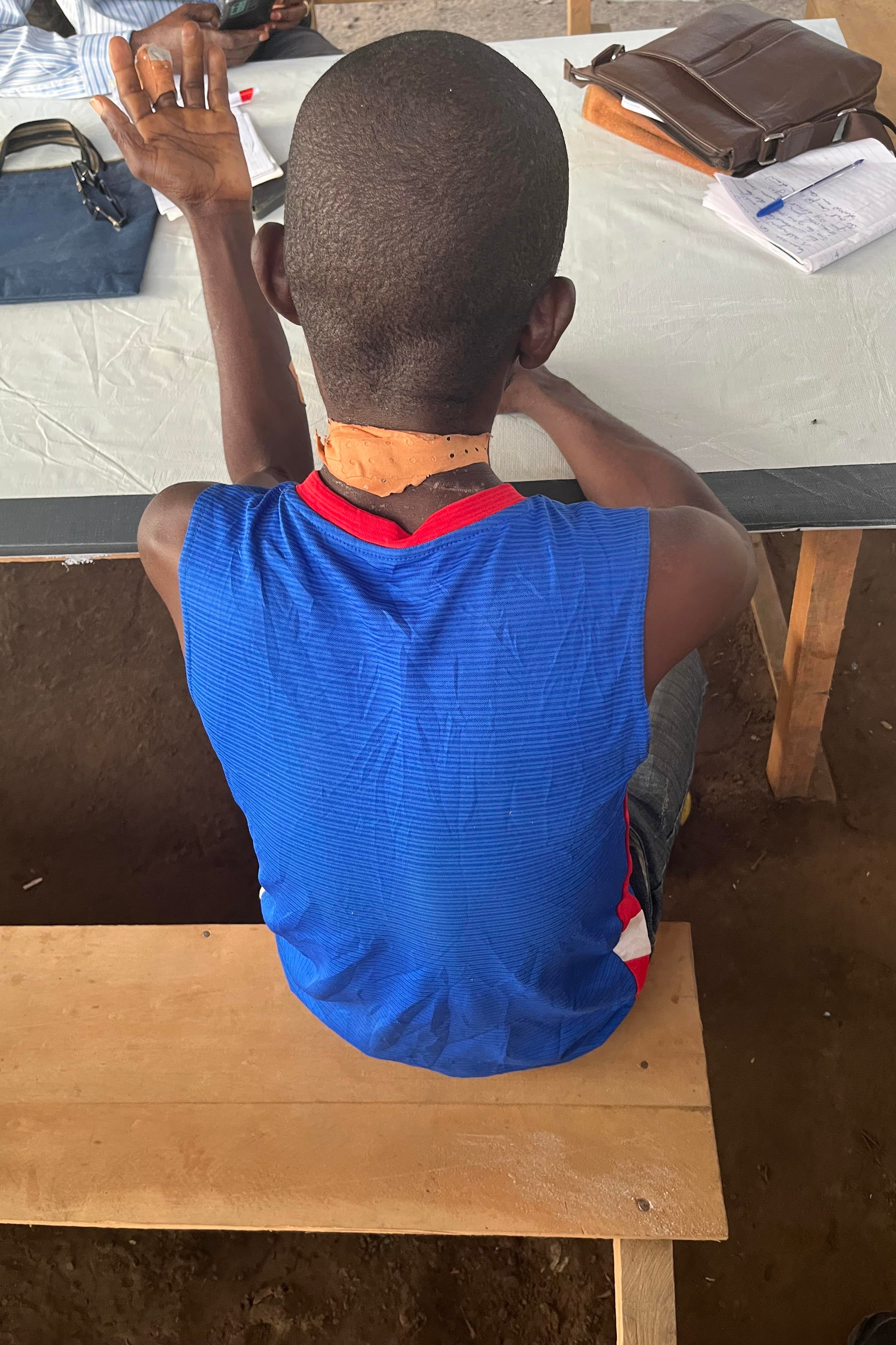 An unidentified man showing wounds