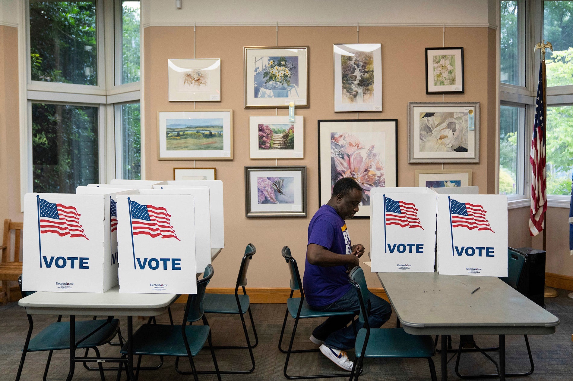 A voter filling out a ballot at the Green Spring Gardens polling station in Lincolnia, Virginia, US, June 20, 2023. 