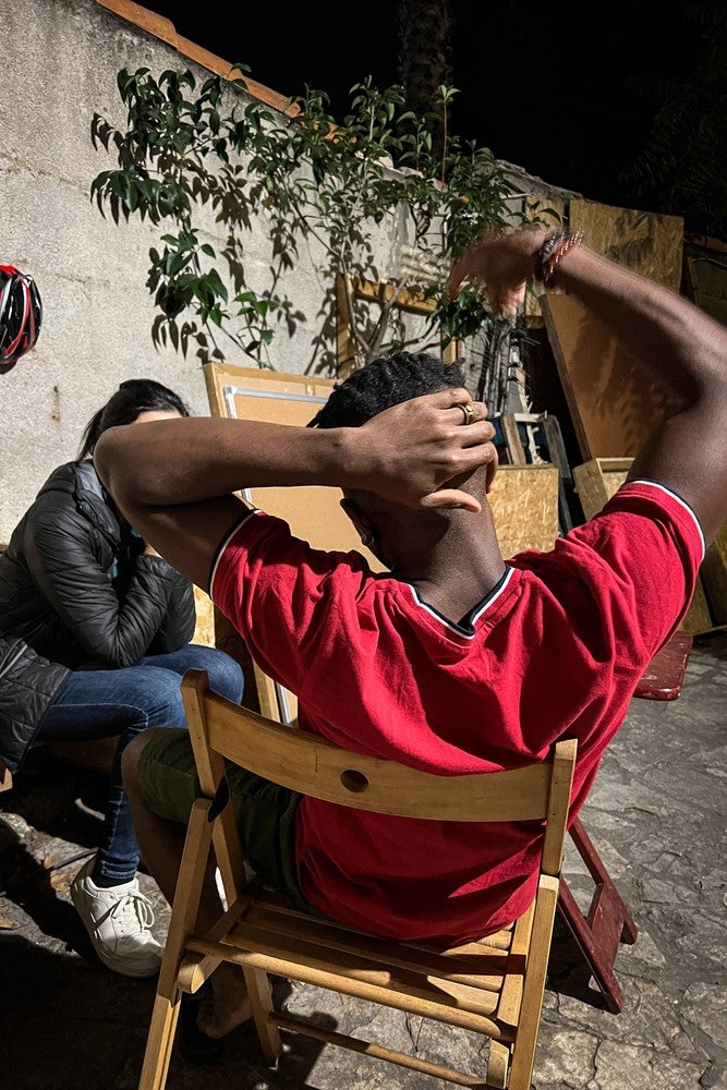 An unidentifiable unaccompanied migrant boy