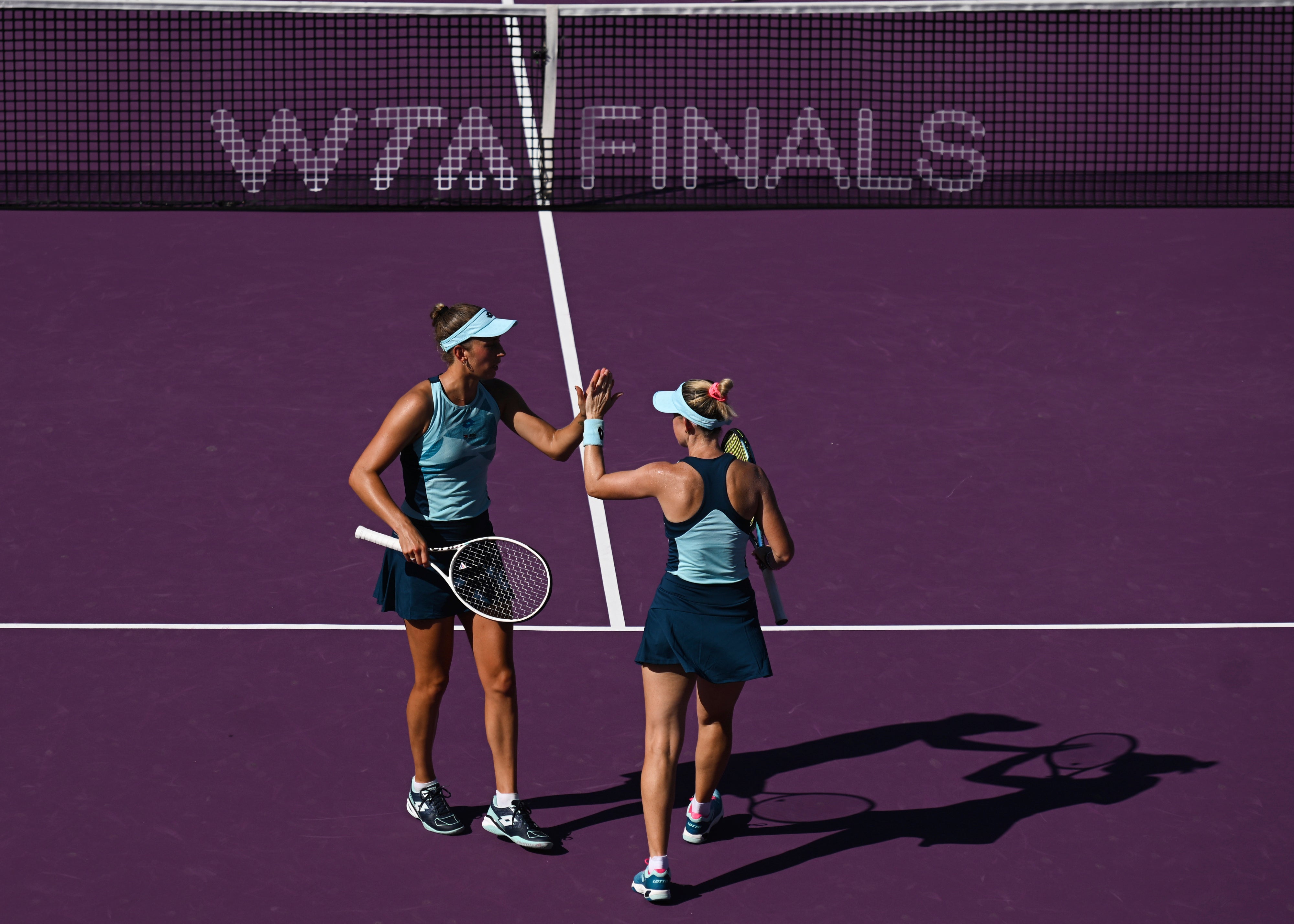Storm Hunter of Australia and Elise Mertens of Belgium during a match during the GNP Seguros Women's Tennis Association Finals in Cancun, Mexico, October 30, 2023. 
