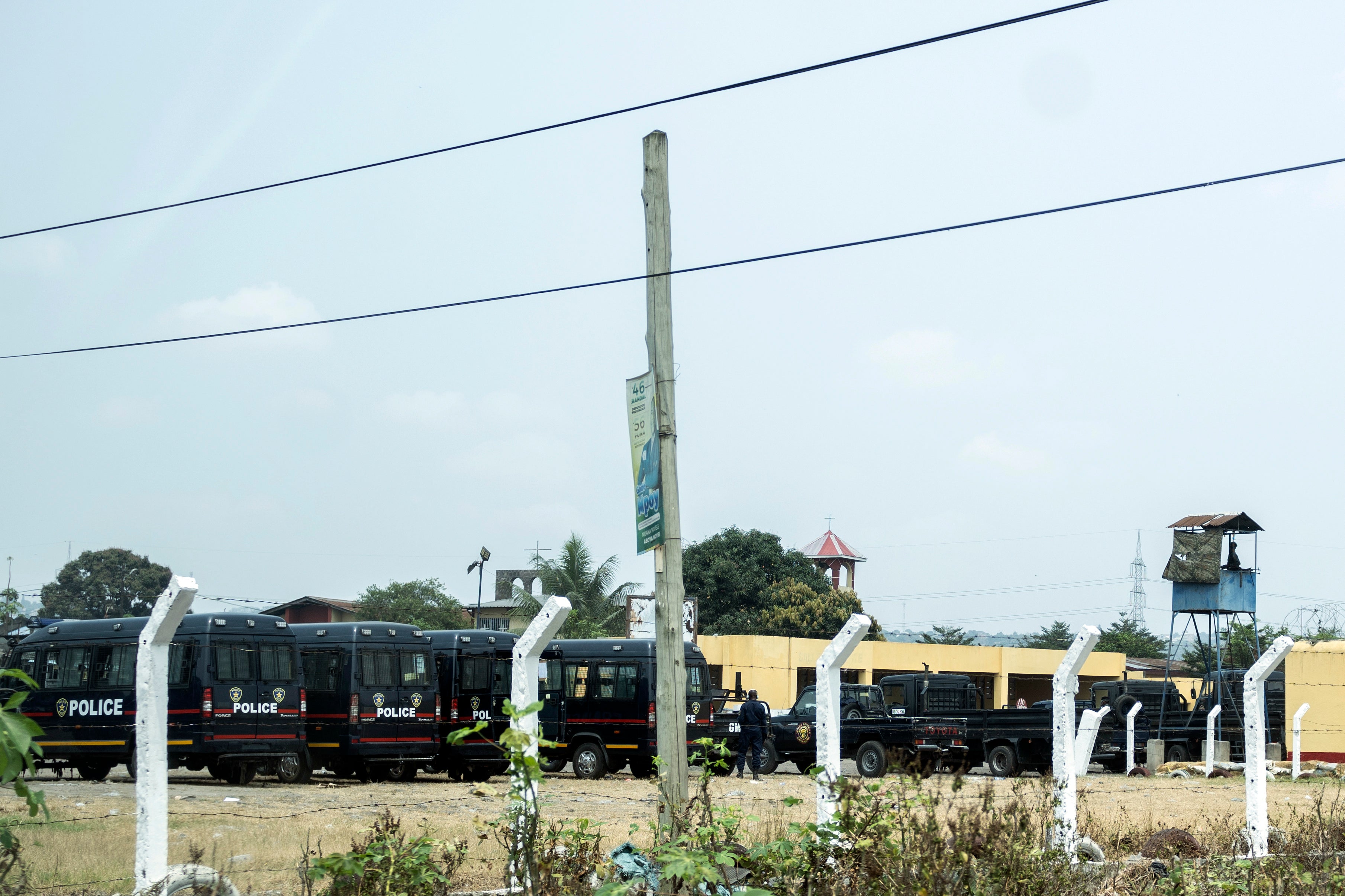 Police vehicles outside the Makala Central prison in Kinshasa, Democratic Republic of the Congo, after an attempted jailbreak left many people dead, September 3, 2024. 