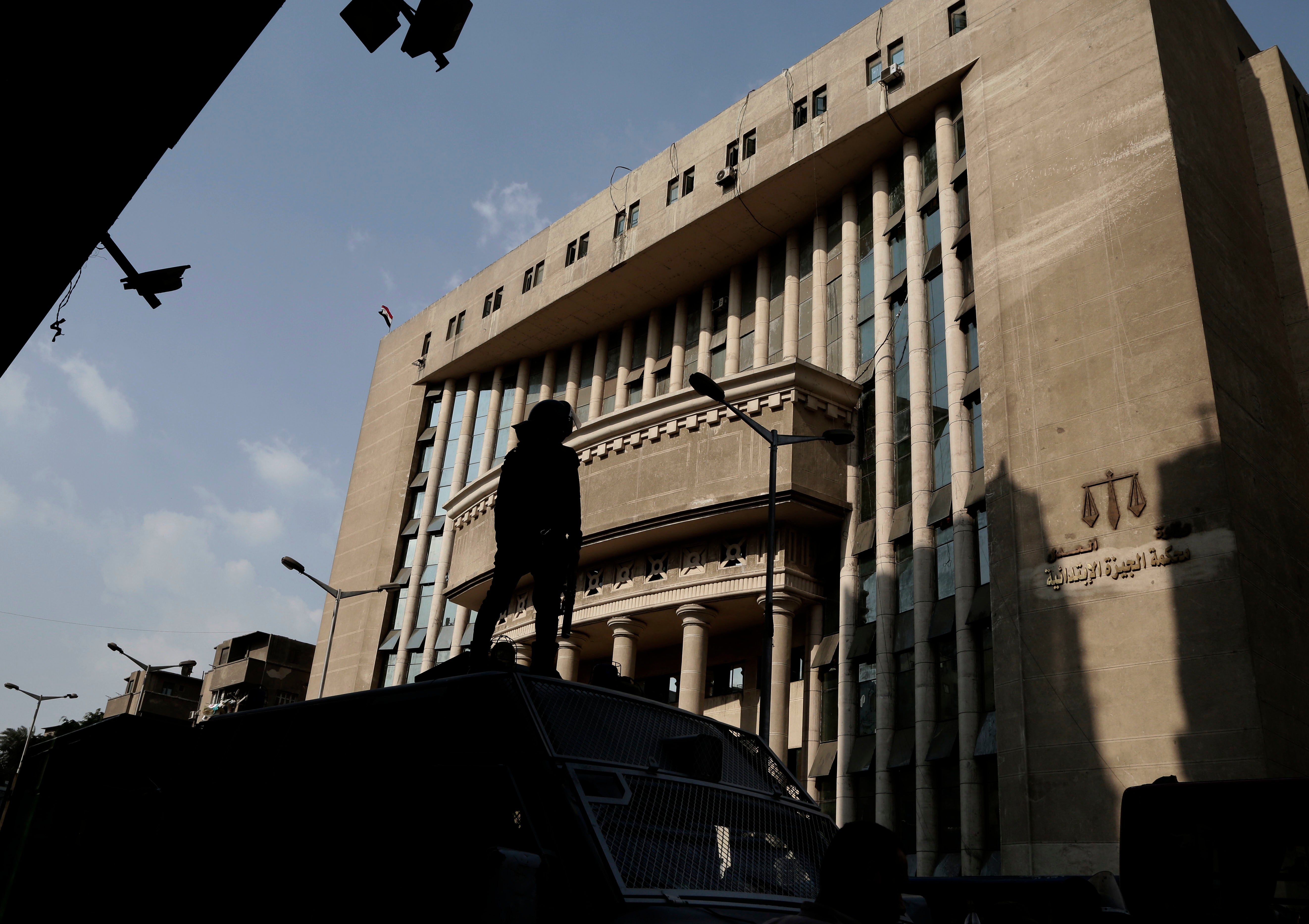 Egyptian security officers guard a courthouse as prominent Egyptian rights lawyer lawyer Khaled Ali, arrives for a hearing, in Cairo, Egypt, November 8, 2017. 
