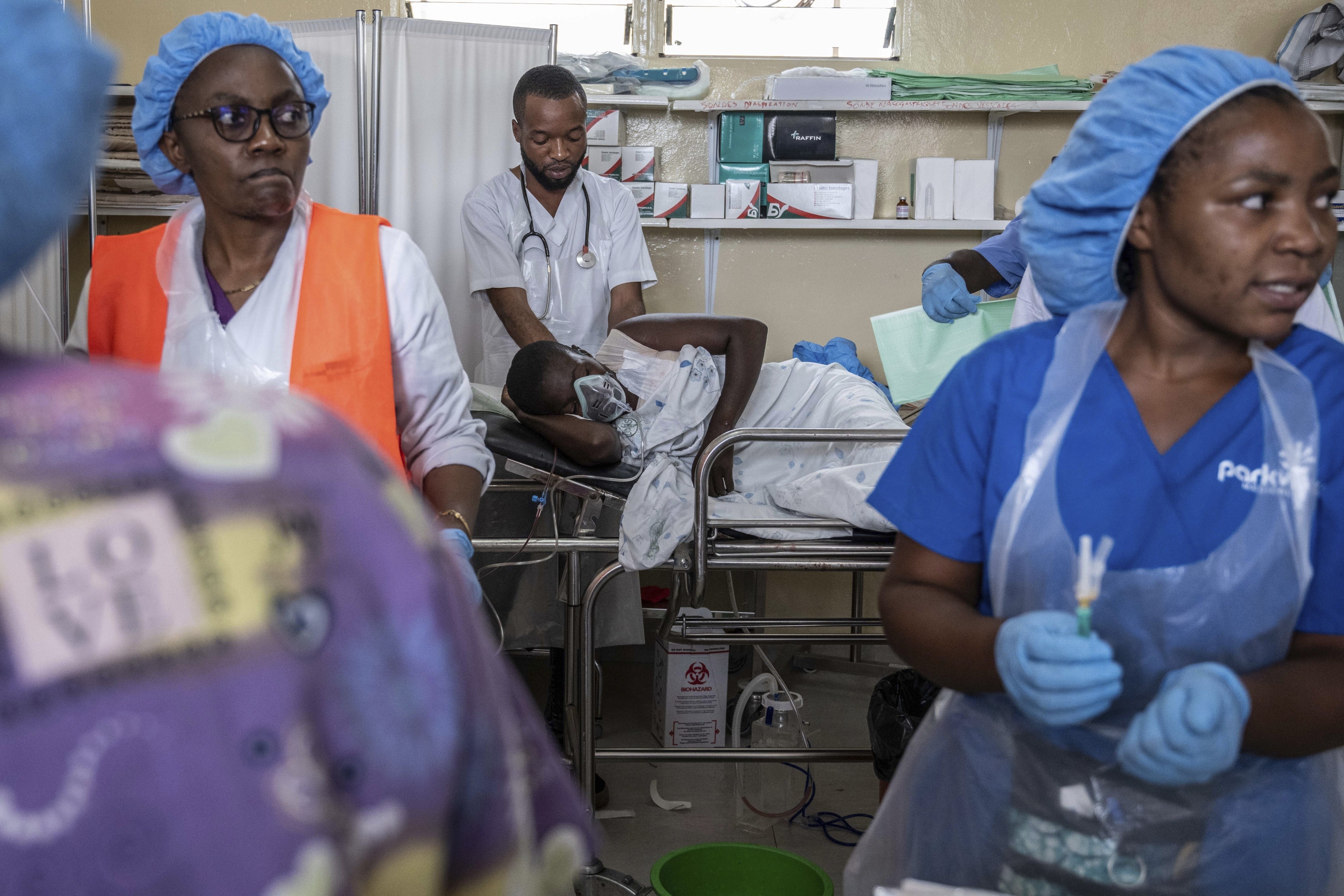 People wounded in fighting arrive at the Cbeca Ndosho hospital in Goma.