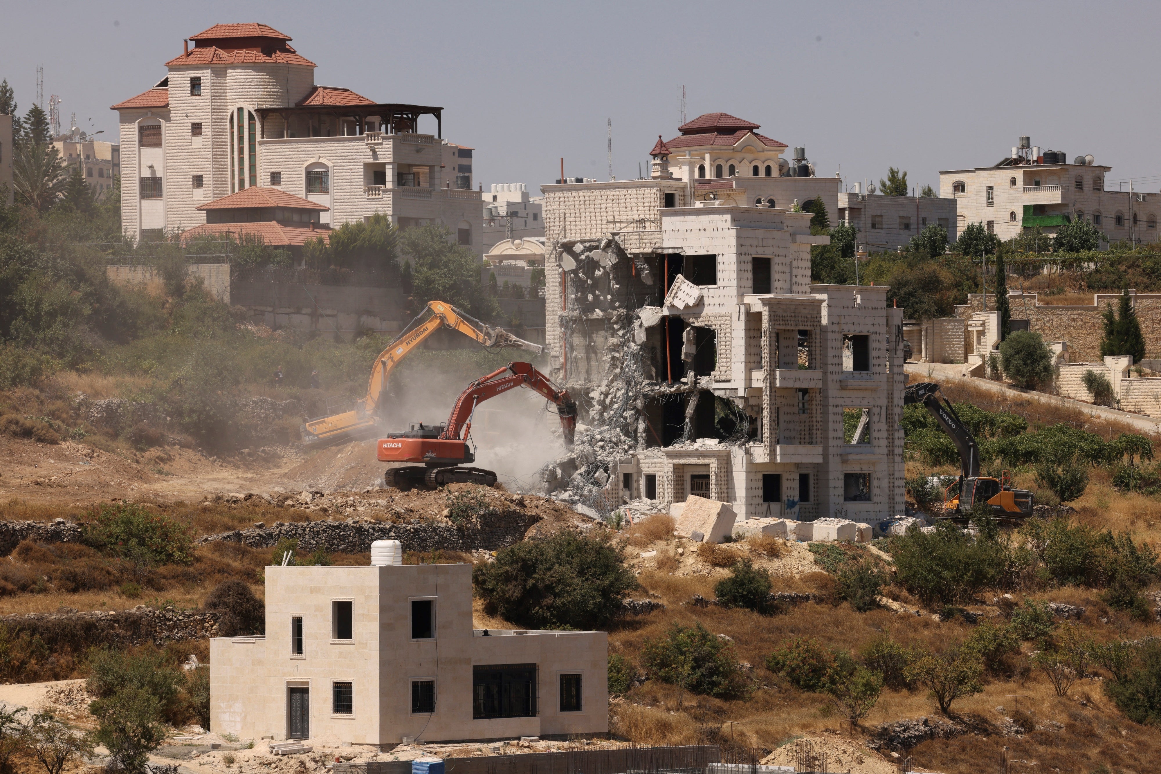 Israeli authorities demolish a Palestinian home under construction in the city of Hebron in the Israeli occupied West Bank. July 25, 2024.