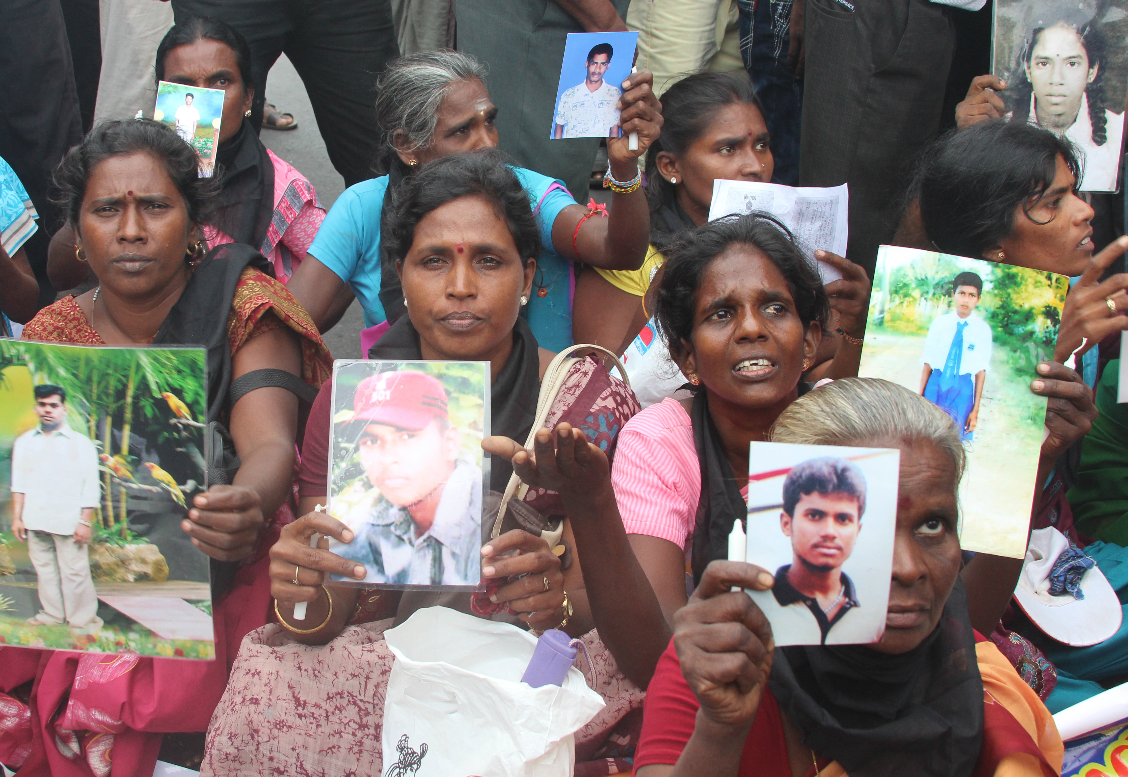 Relatives of people who disappeared during or after the civil war protest in Jaffna, Sri Lanka, November 15, 2013.