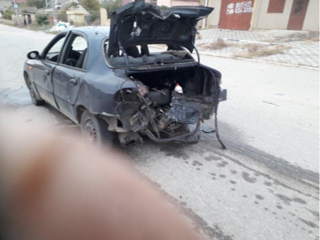 Vitaliy’s damaged car after it was struck by a quadcopter drone. 