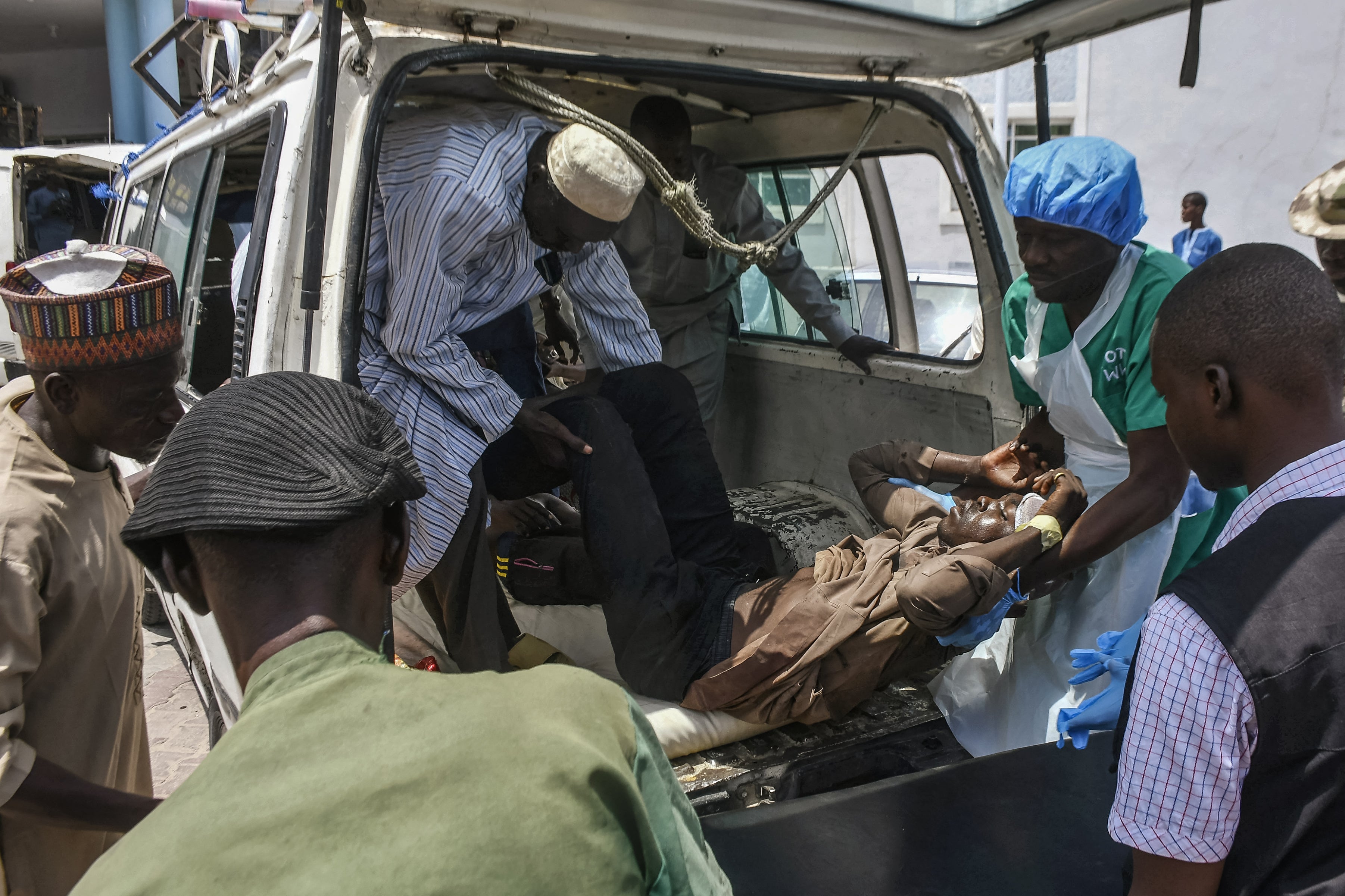 A victim of a recent wave of suicide attacks arrives for treatment at a hospital in Maiduguri on June 29, 2024.
