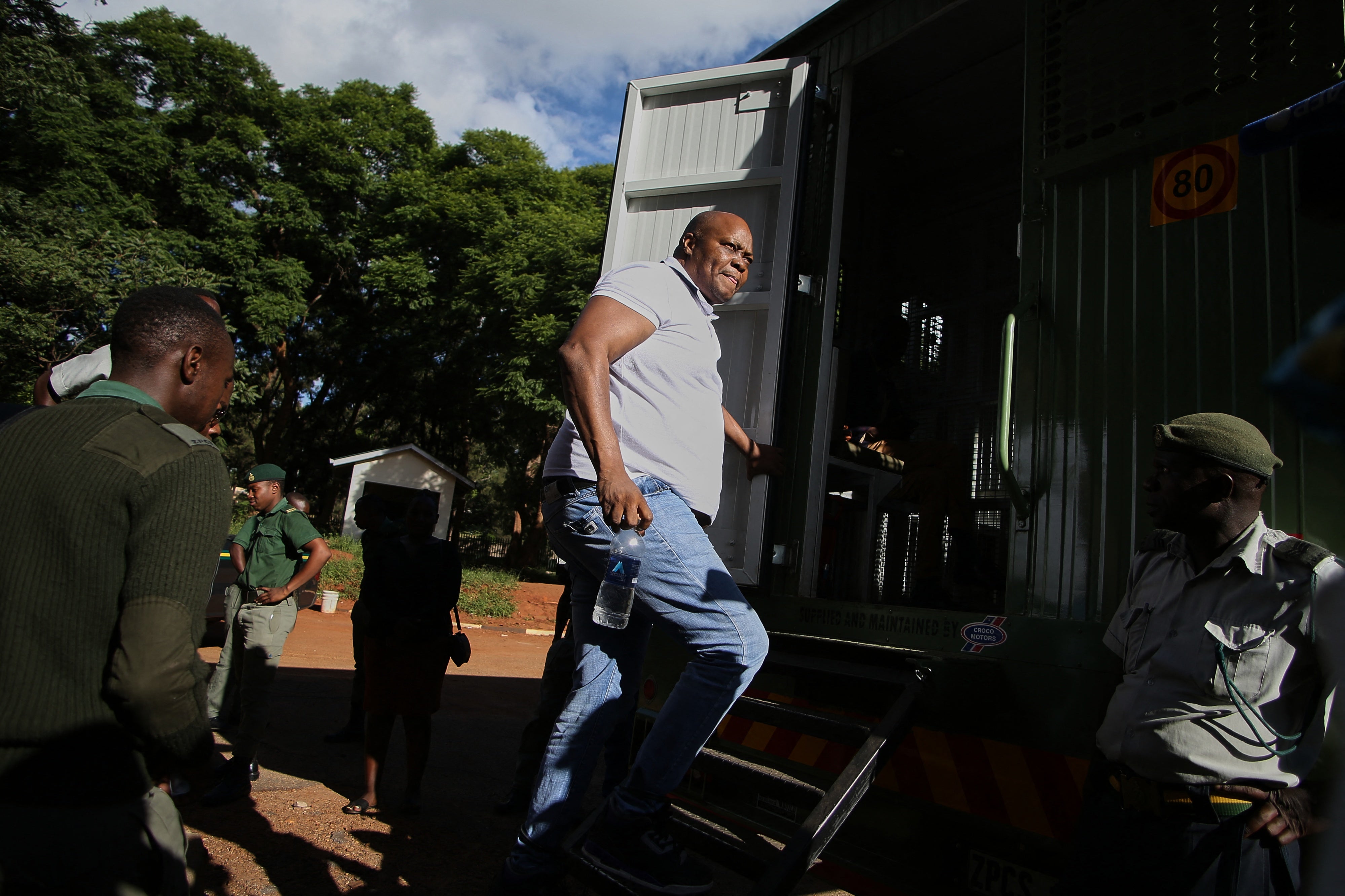 Job Sikhala, former legislator and member of the Zimbabwean opposition party Citizens Coalition for Change, climbs into a prison truck at the magistrates court in Harare, Zimbabwe, January 24, 2024.