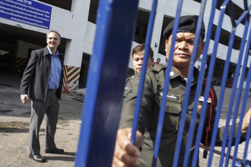 British rights activist Andy Hall arrives at the Phra Khanong Provincial Court in Bangkok, Thailand on October 29, 2014. 