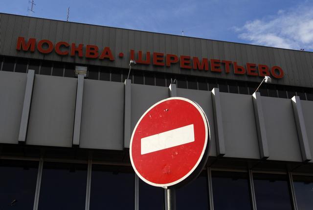 A stop sign is seen outside Sheremetyevo airport in Moscow