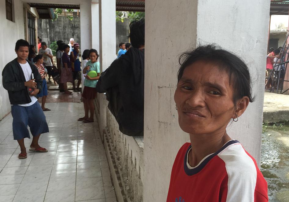 "Nora," 33, who walks with a limp, was picked up by local authorities on the evening of November 11. She said that one official picked her up and threw her to the floor of a truck, bruising her back and legs. November 13, 2015.