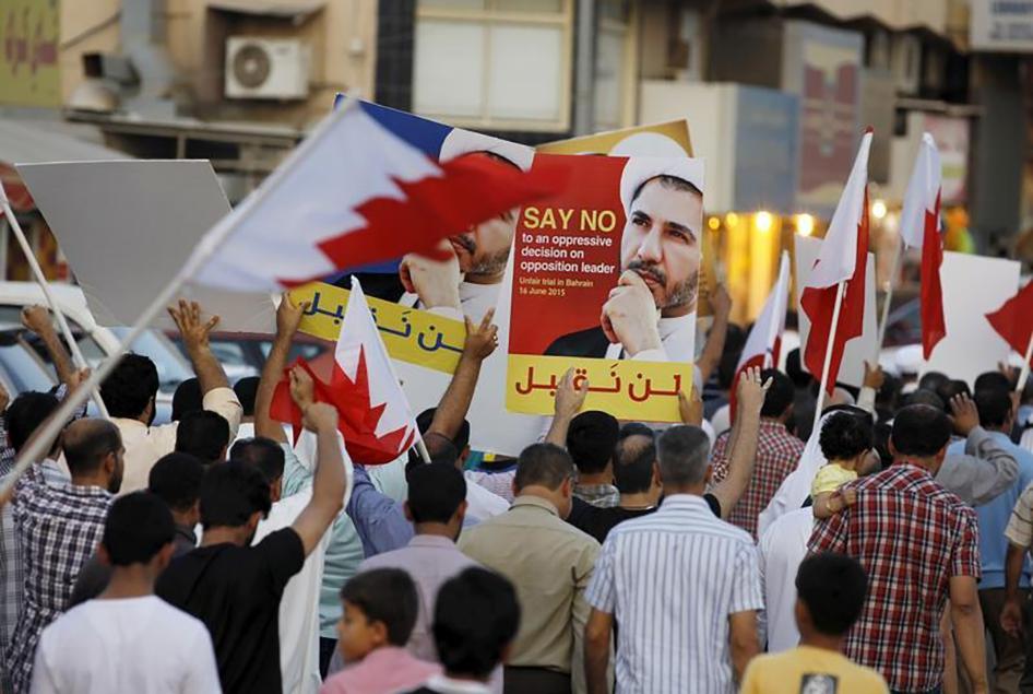 Protesters hold photos of Sheikh Ali Salman, Bahrain's main opposition leader and Secretary-General of Al-Wefaq Islamic Society, as they march asking for his release in the village of Jidhafs, west of Manama, in Bahrain on June 16, 2015. 