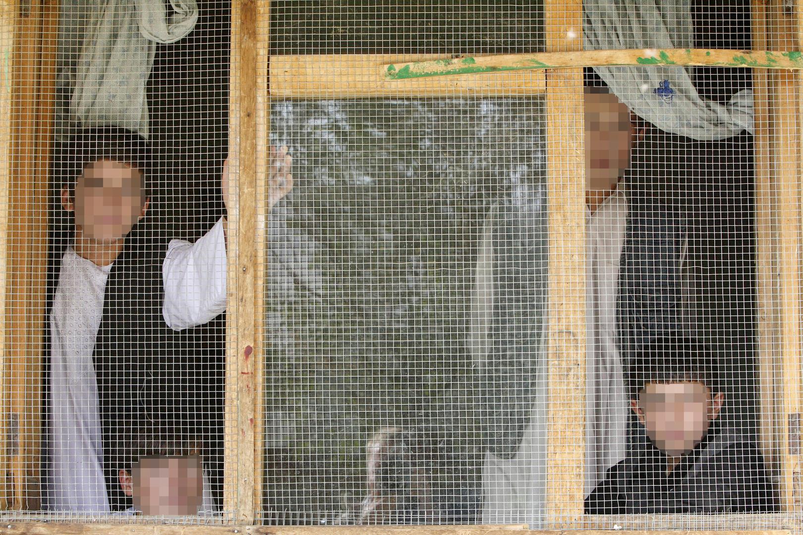 Boys in a youth prison that may hold national security suspects, Feyzabad, Afghanistan.