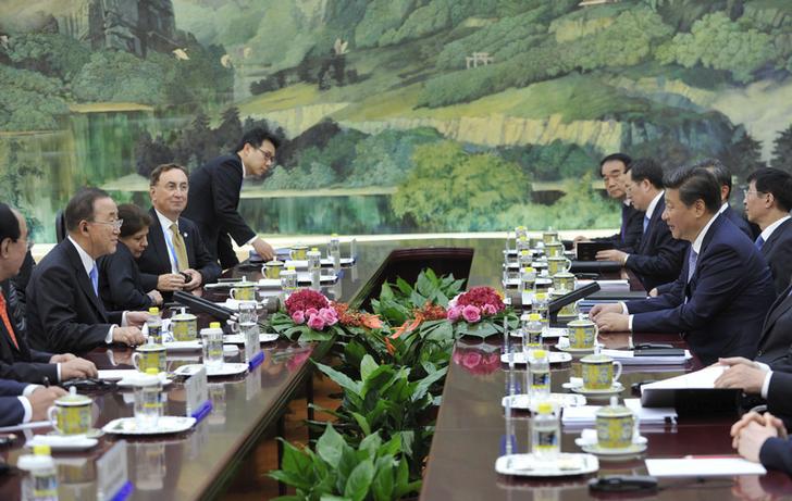 Chinese President Xi Jinping (R) attends a meeting with United Nations Secretary-General Ban Ki-moon (2nd L) at the Great Hall of the People in Beijing, China, September 3, 2015.