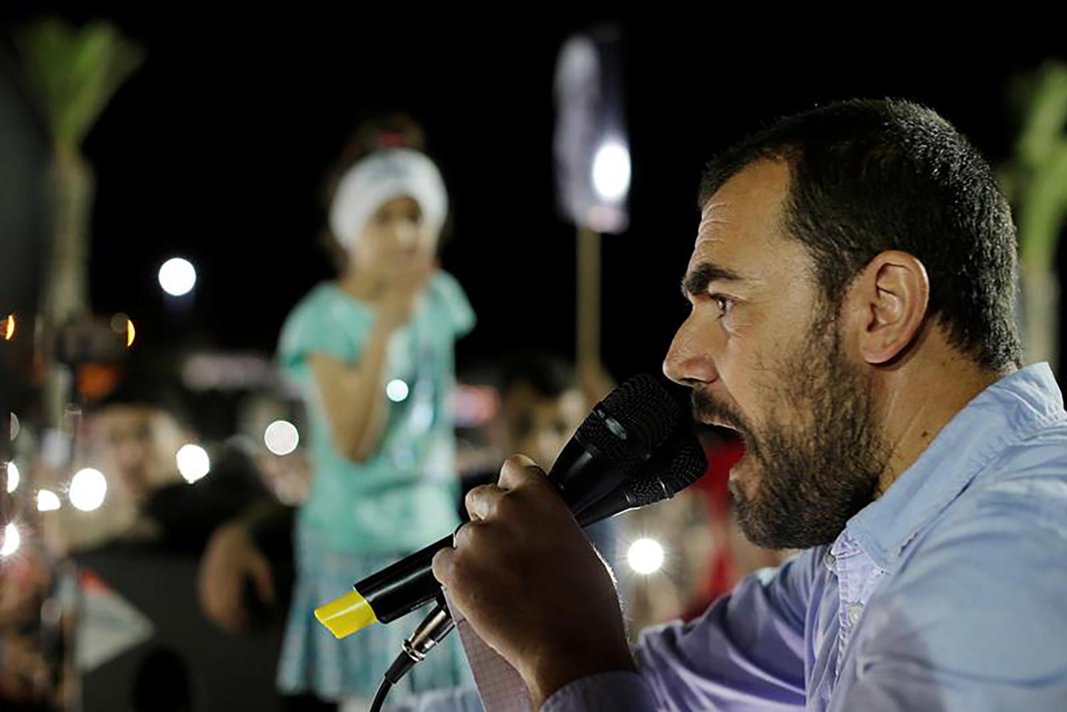 Moroccan activist Nasser Zefzafi gives a speech during a demonstration against injustice and corruption in the northern town of al-Hoceima, Morocco, May 18, 2017. 