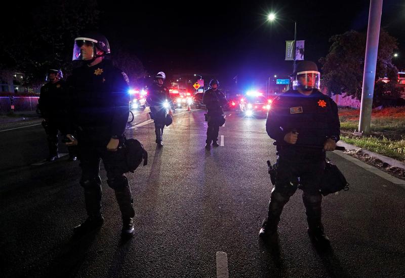 Demonstrators gather outside City Hall to protest the police shooting of Stephon Clark, in Sacramento, California, U.S., March 30, 2018. 