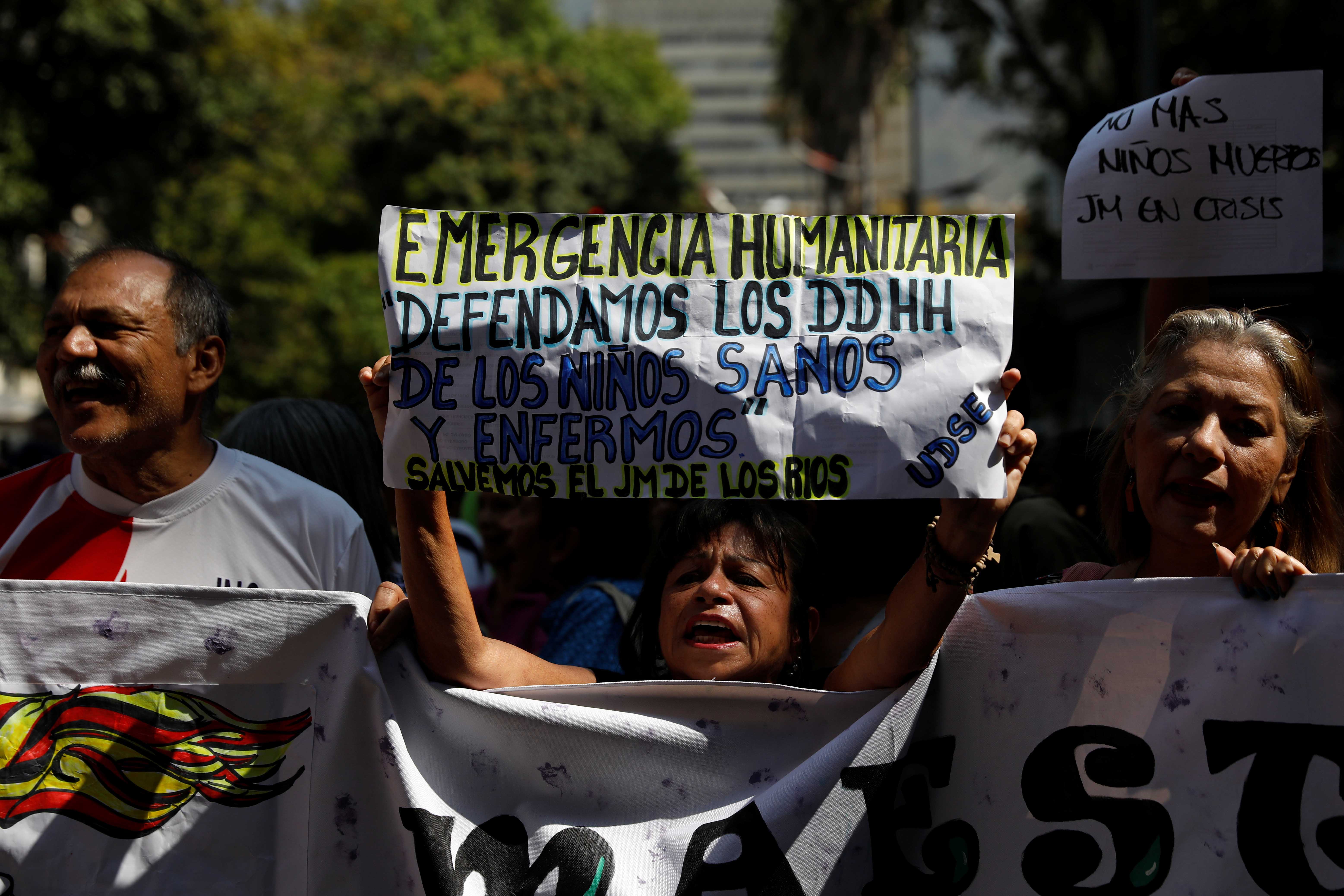 People protest outside the children's hospital JM de los Rios because of lack of medicines, in Caracas, Venezuela March 12, 2020.