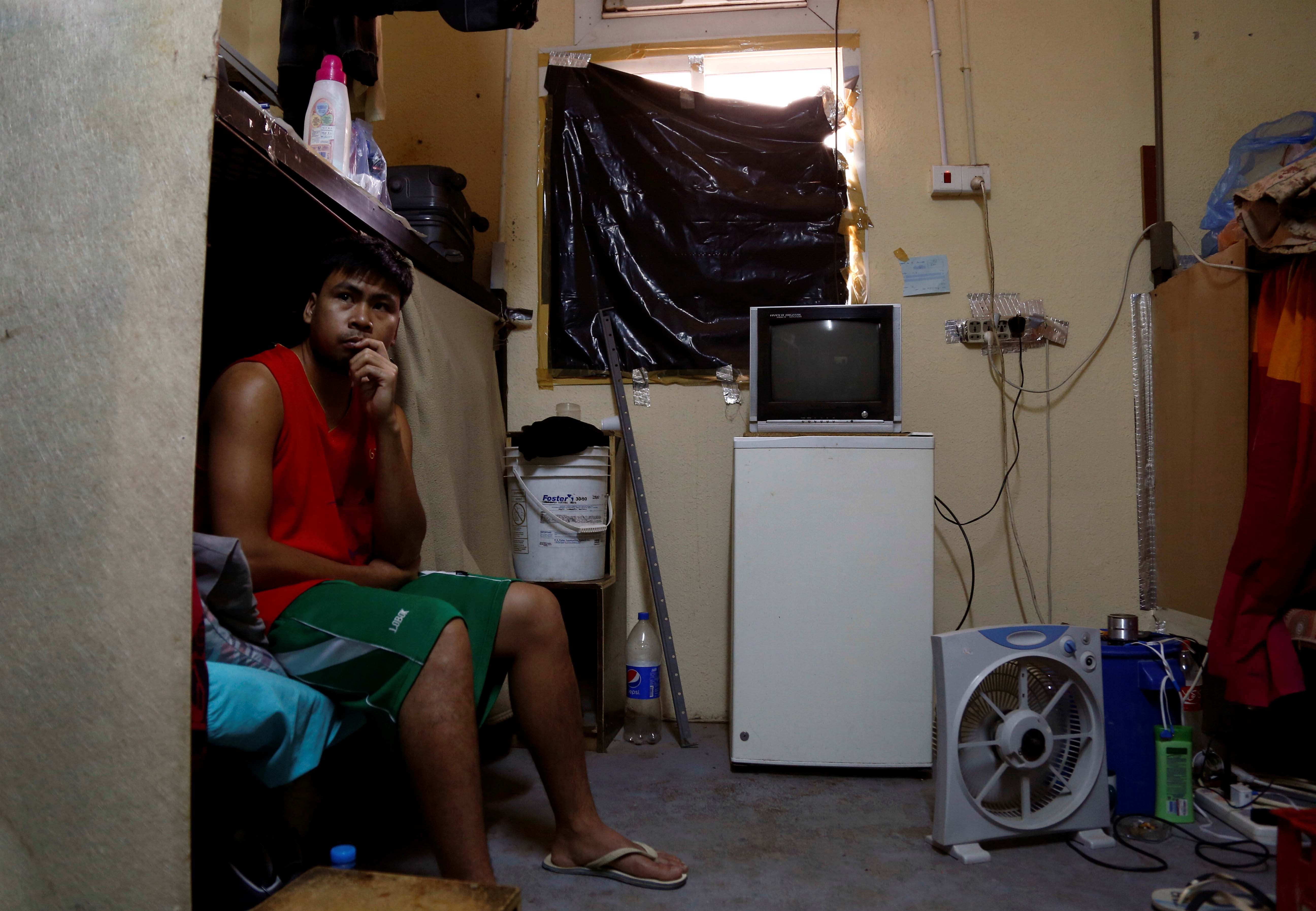 A worker rests at his accommodation in Qadisiya labor camp, Saudi Arabia August 17, 2016. 
