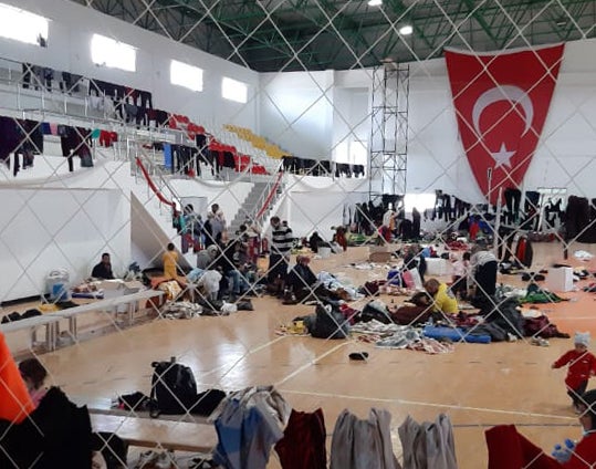 175 Syrian asylum seekers were held in a sports hall in the Turkish controlled part of northern Cyprus for two days before being transferred to apartment buildings where they continue to be detained. Photo taken in March 2020.