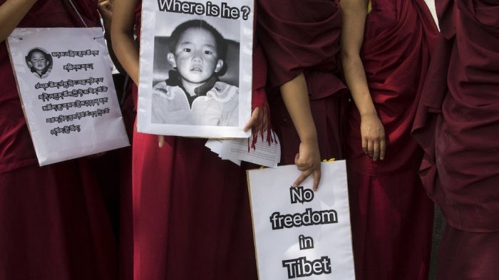  Exile Tibetan Buddhist nuns carry placards during a protest march demanding the release of their religious leader Gedhun Choekyi Nyima, the 11th Panchen Lama, who was put under house arrest by the Chinese authorities this day in 1995 in Tibet, in Dharmsala, India, Wednesday, May 17, 2017.
