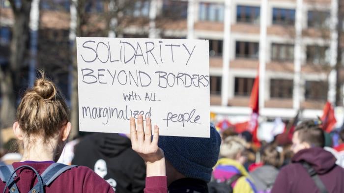 A participant at a feminist protest on international women’s day in Munich, Germany on 8 March 2020.