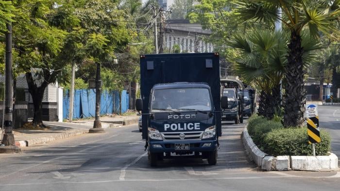 Police car is seen on a street during the military coup demonstration.