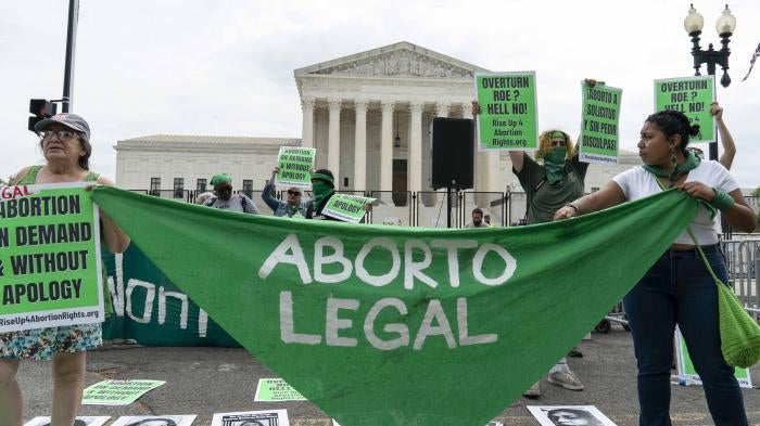 Abortion rights activists protest outside of the U.S. Supreme Court on Capitol Hill in Washington, DC, Tuesday, June 21, 2022.