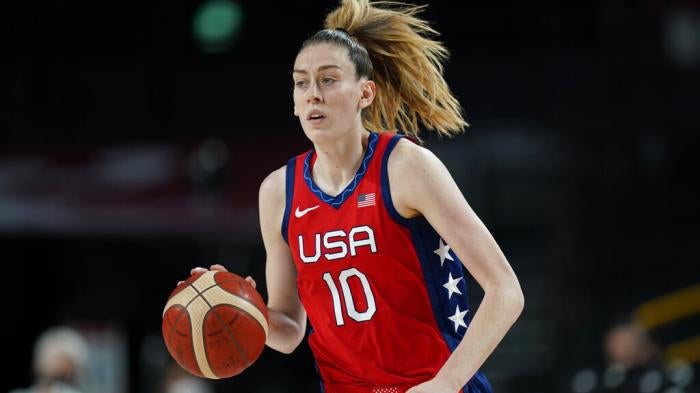 Breanna Stewart, US national basketball player dribbles basketball on court