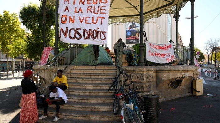 Children protesting with signs