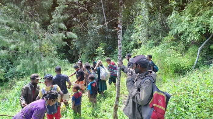 Villagers fleeing fighting between the Indonesian military and the West Papuan militants to Sugapa, the capital of Intan Jaya regency.