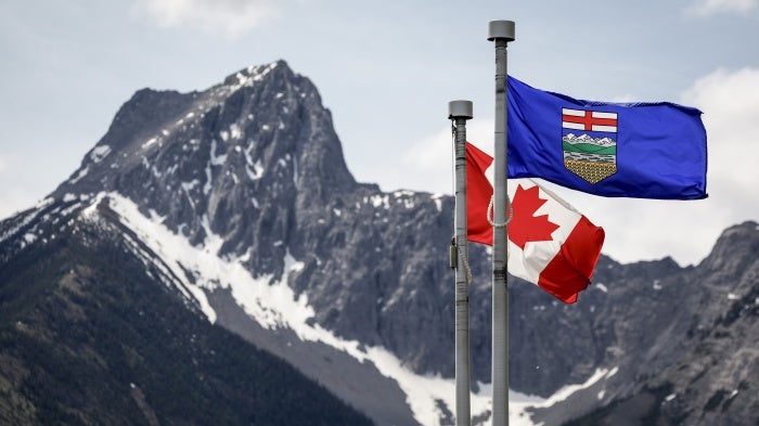 A Canada flag and an Alberta flag in Kananaskis, Alberta, June 2, 2025.  