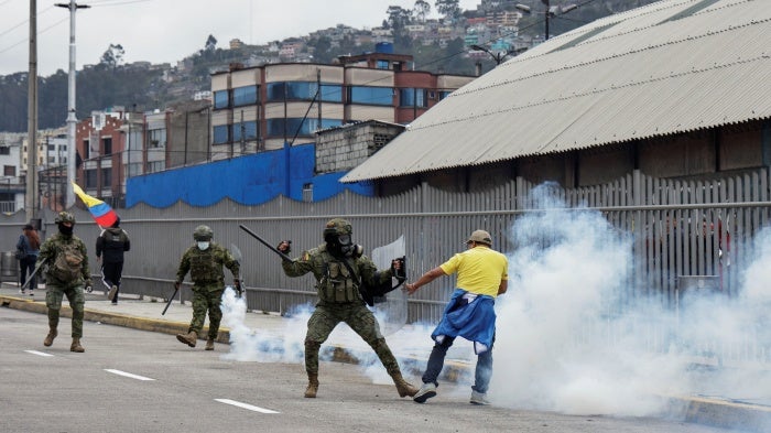 An army member clashes with a protester during a demonstration against diesel price hikes and other economic measures by Ecuadorean President Daniel Noboa’s government, in Quito, Ecuador October 12, 2025.