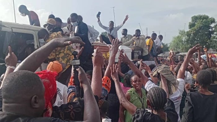Mourners at the funeral for seven victims of the attack on Nkana on November 23, 2025, in Makulu, Democratic Republic of Congo, December 5, 2025. 