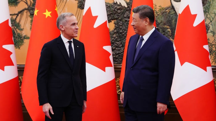 Canadian Prime Minister Mark Carney, left, meets with Chinese President Xi Jinping