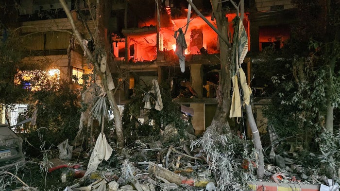 A damaged building is on fire after an Israeli airstrike in Beirut's southern suburb of Haret  Hreik, March 2, 2026.