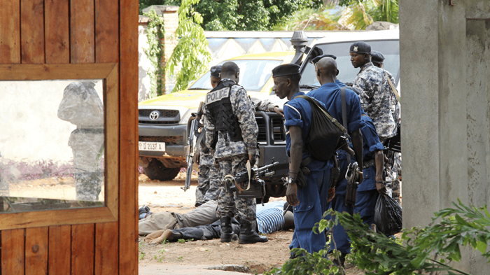 Burundian police hold suspects after discovering an alleged ammunition cache near Bujumbura, December 9, 2015.  