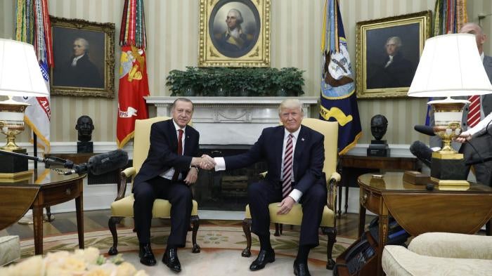 Turkey's President Recep Tayyip Erdogan shakes hands with U.S President Donald Trump in the Oval Office of the White House in Washington D.C., May 16, 2017.