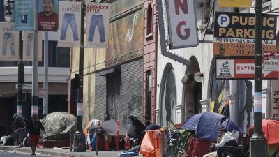 Tents line a sidewalk on Golden Gate Avenue in San Francisco, Saturday, April 18, 2020. 
