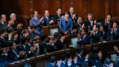 Sanae Takaichi is applauded after being elected Japan's new prime minister, October 21, 2025.
