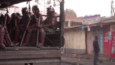 Kenyan Soldiers on a police truck.