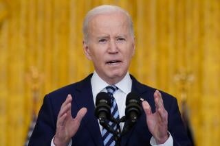 US President Joe Biden speaks in the East Room of the White House in Washington, February 24, 2022.
