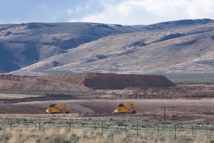 Two backhoes at a construction site for Thacker Pass