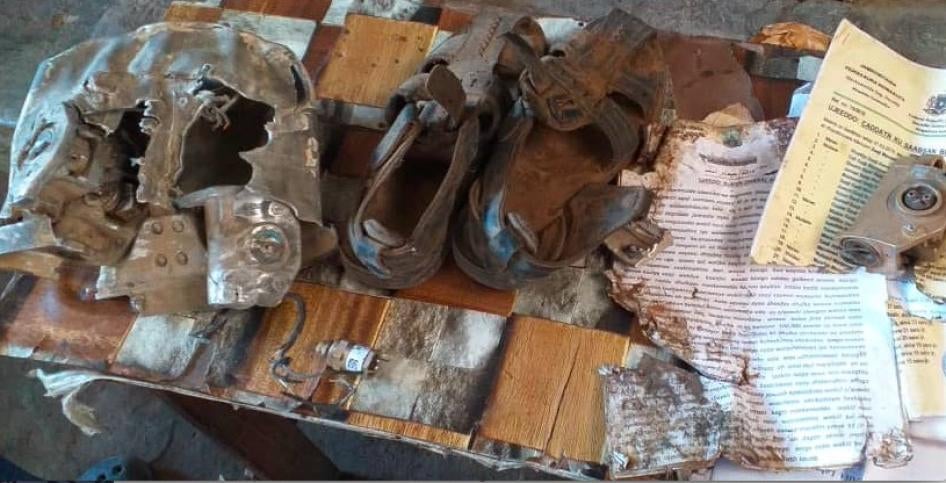 Relatives of the six people known killed in the March 10, 2020 US airstrike on a minibus near the village of Ugunji in Lower Shabelle, Somalia, collected the few objects and possessions they could find during a visit to the site soon after the attack.&nbsp;© 2020 Private  