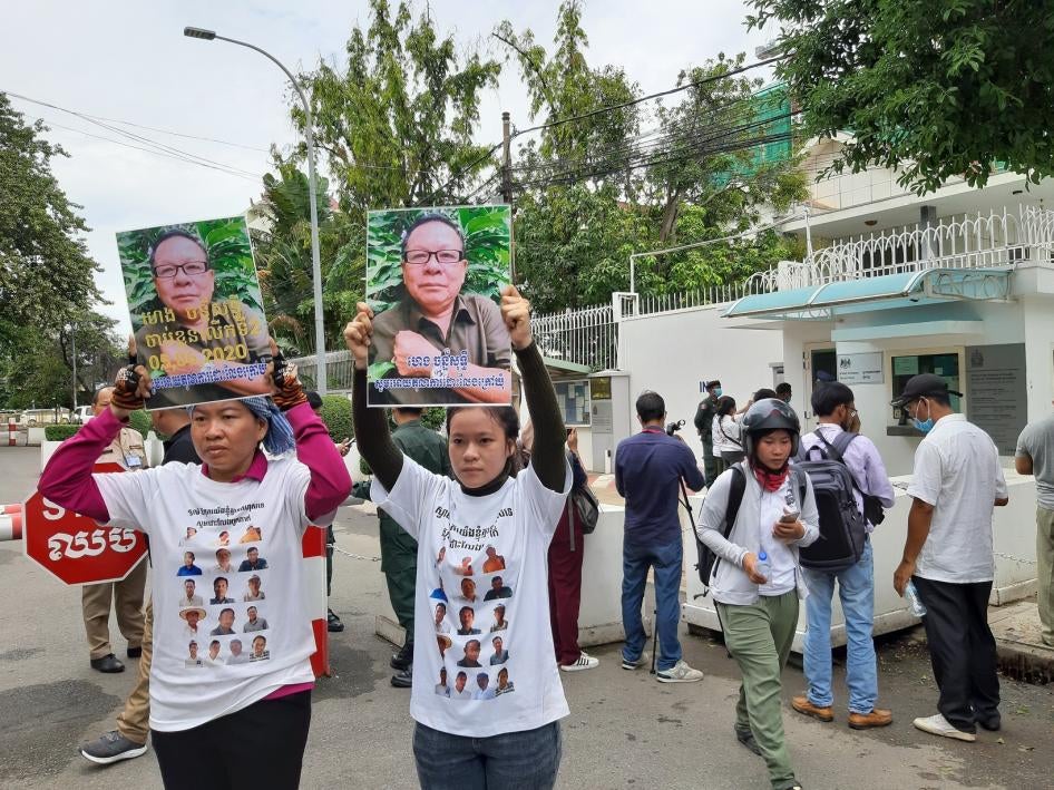 Family members of detained opposition activists hand in a petition calling for the British Embassy to ​speak out on human rights in Cambodia, July 24, 2020. 
